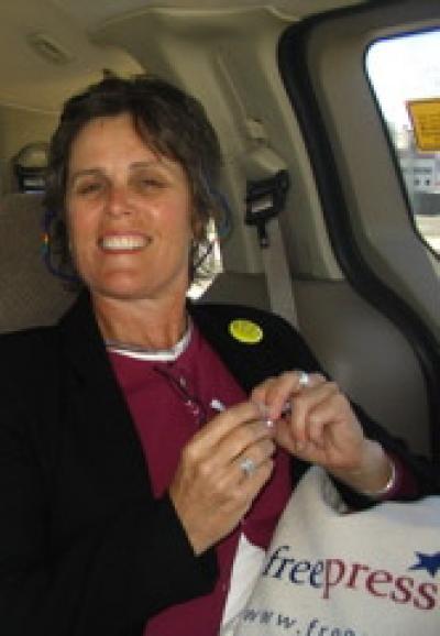  ACME Board Member Betsy Gleckler wearing "FCC" Button